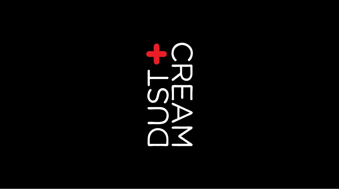 Dust + Cream vertical logo with red plus sign on black background